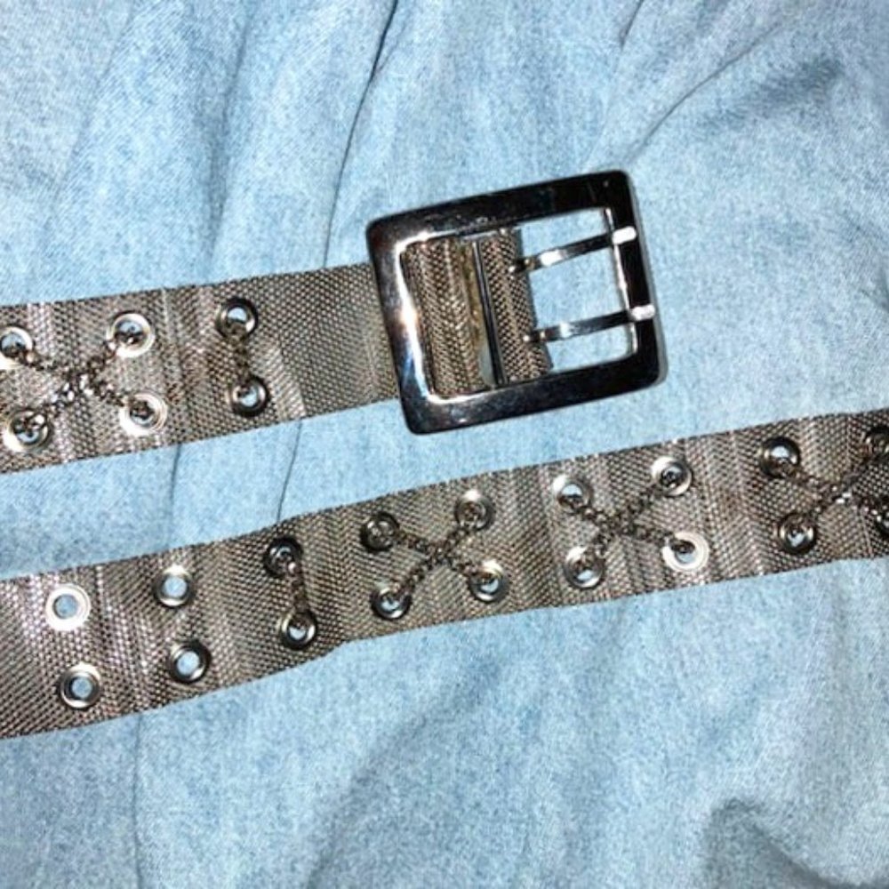 Silver tone Metal belt with crossing chain accents
